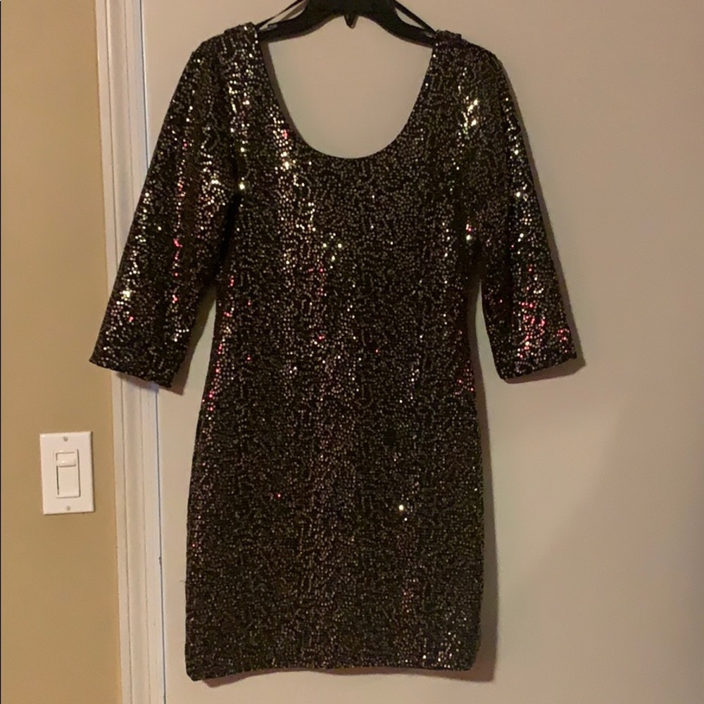 Black and gold sequin dress
